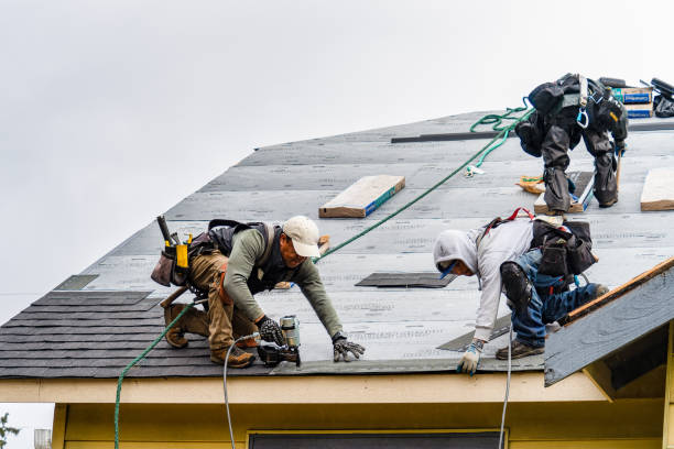 Professional Emergency Roof Repair technician working in Wampsville, NY